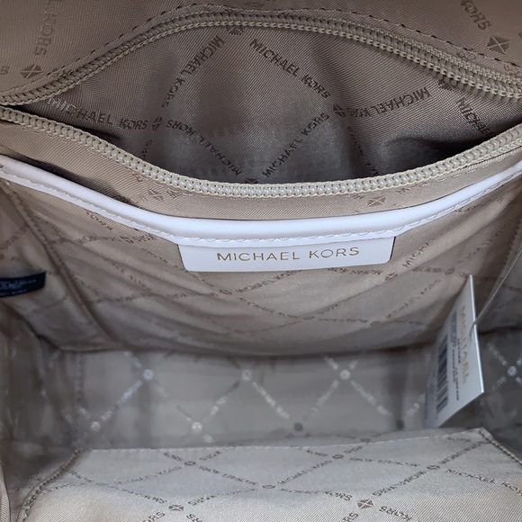 Michael Kors Jaycee Medium Pebbled Leather Backpack
Light Cream - Picture 9 of 13